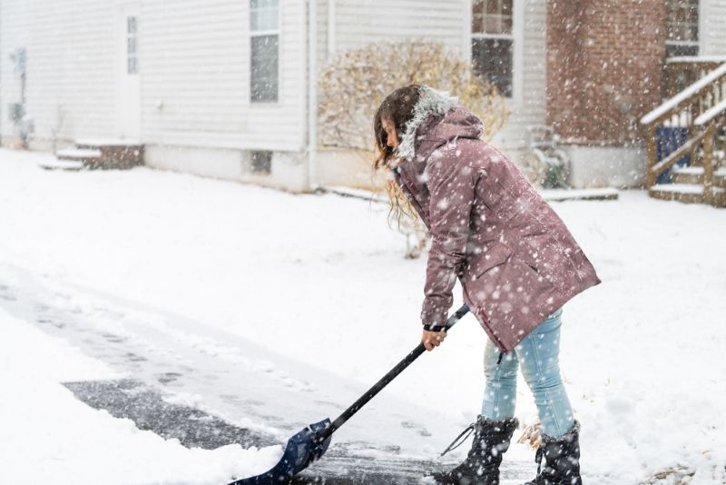 shoveling snow and ice in cold weather